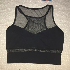 Forever 21. Size M. Black sports bra. Mesh cut out